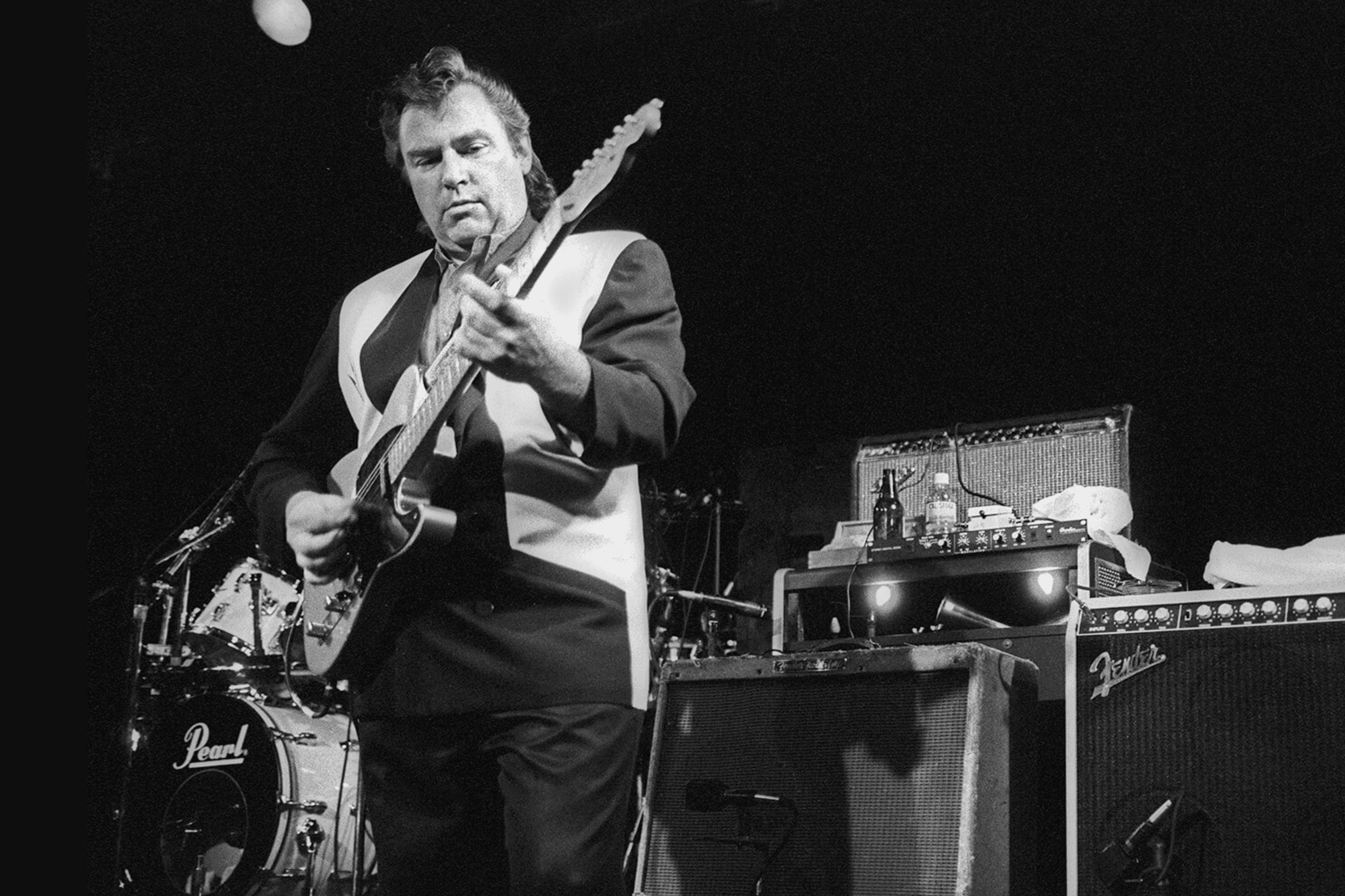 Danny Gatton playing guitar on stage