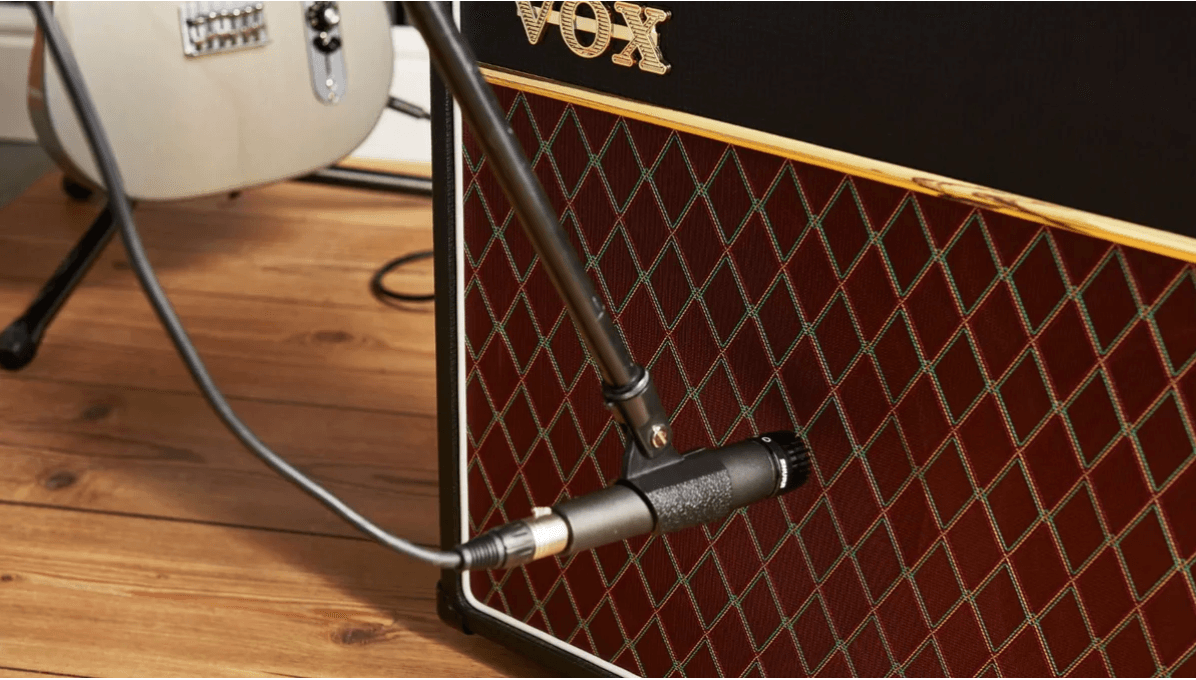 vox amp with a mic in front of it