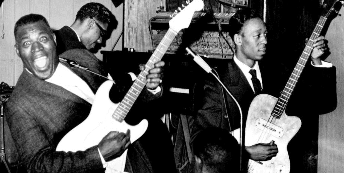 Howlin' Wolf playing guitar